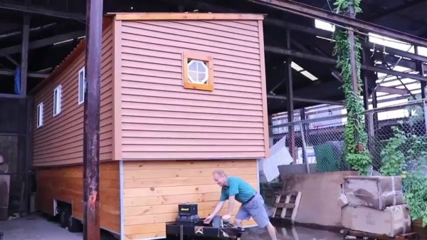 Two-Story Tiny House on Wheels with Electric Lift for Second Floor 001