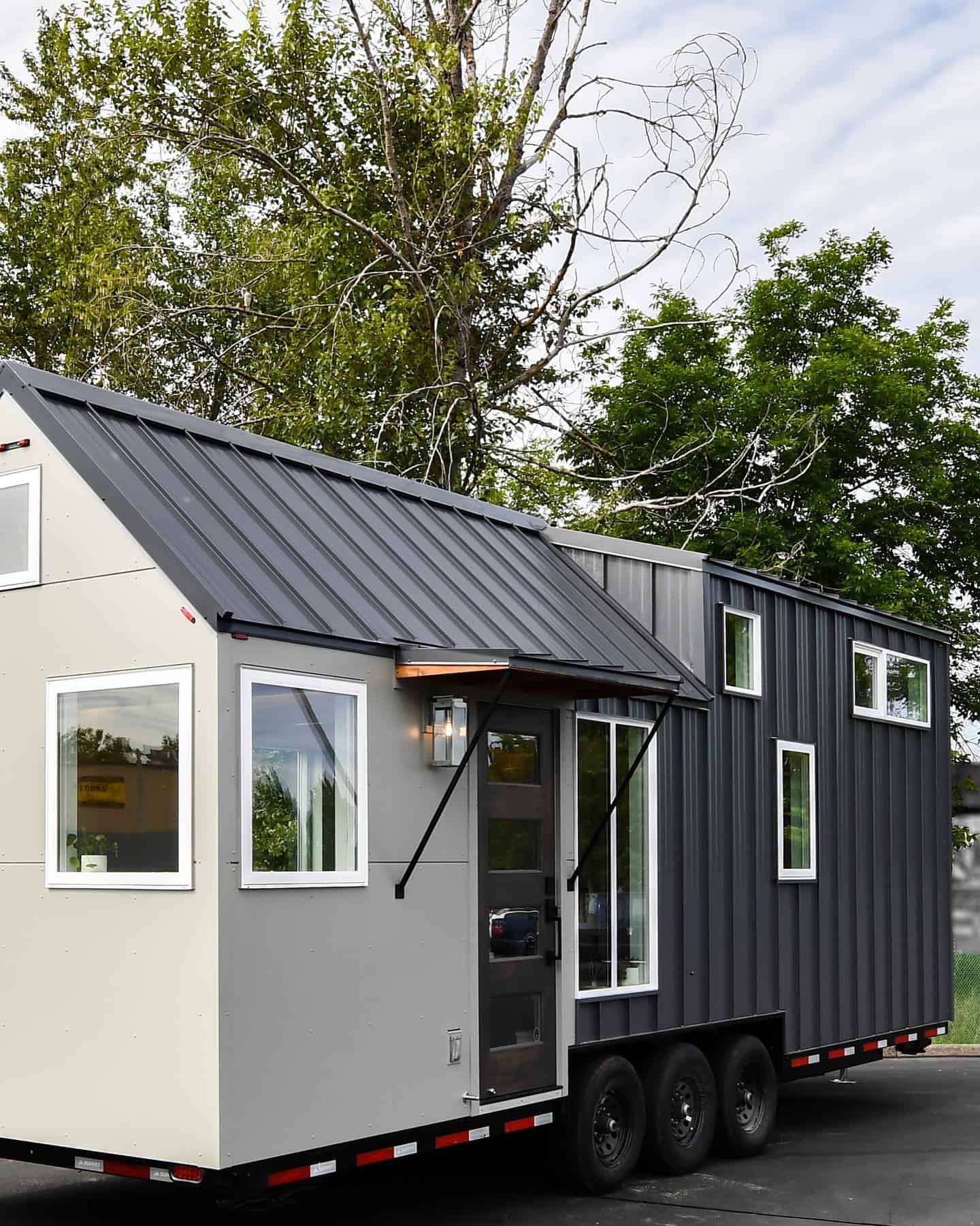 Modern Tiny House with Sleek Design and Large Windows