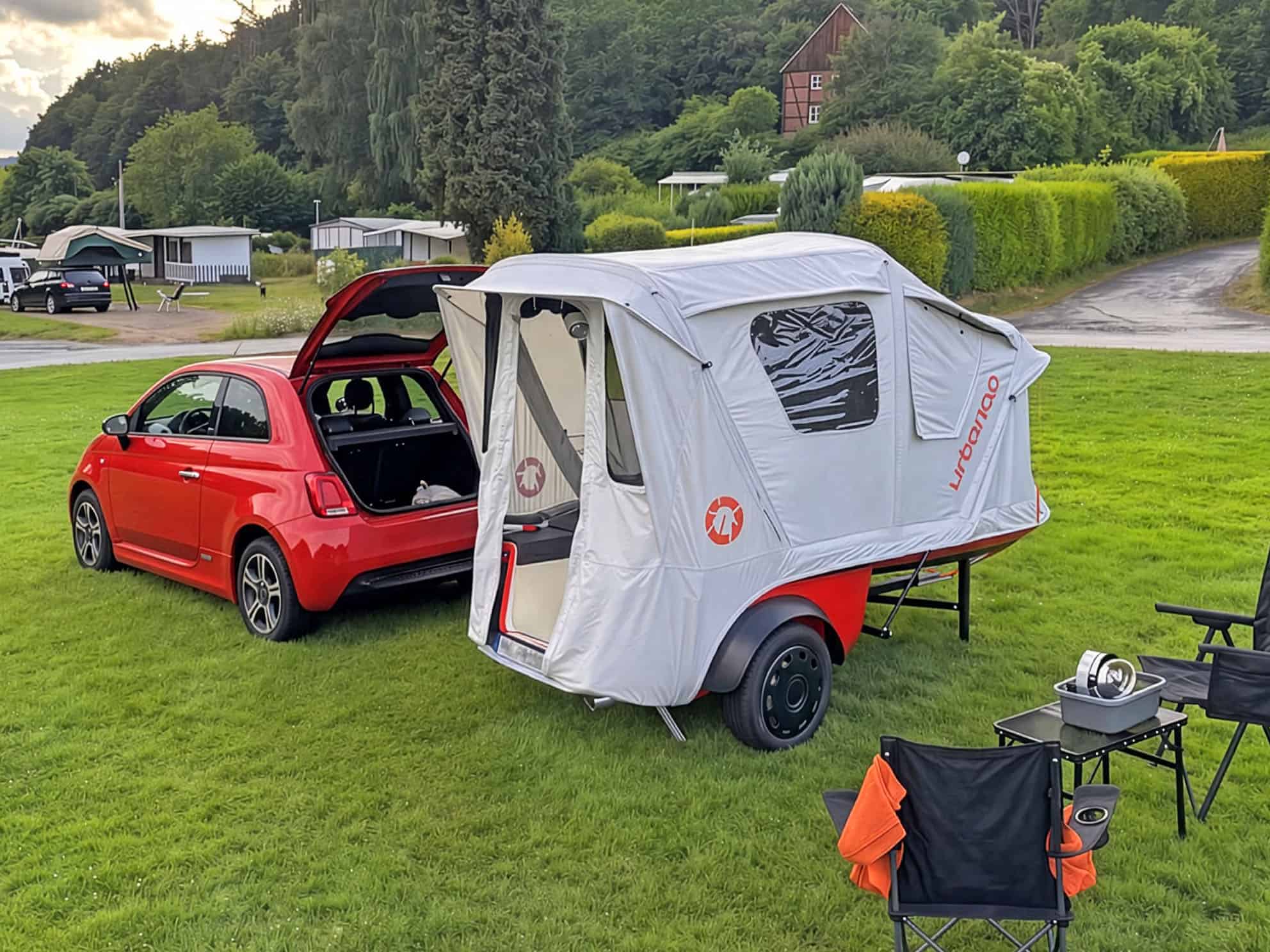 Urbanoid Booba pitched at a German campsite beside a red Fiat 500 with the tent door open