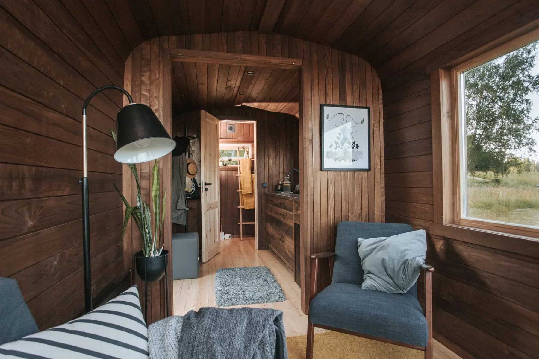 The Nature Pod interior looking from the armchairs toward the entry hallway and front door