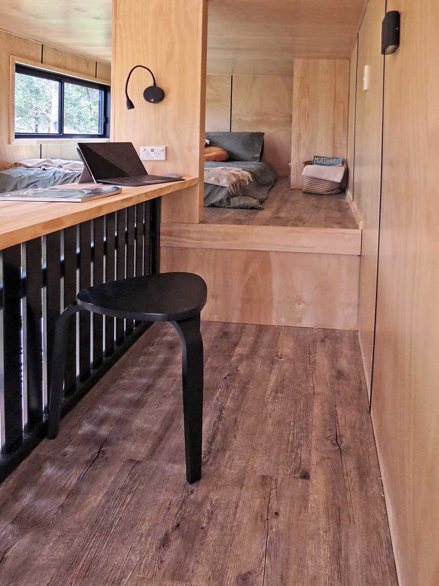 View from the upper level toward the bedroom in the Wildscape tiny house