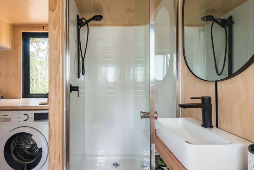 Shower with black mixer tap in the Wildscape tiny house bathroom