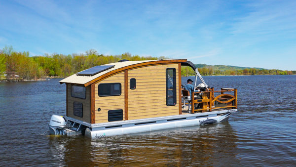 Woodworker Designs and Builds the Perfect Tiny House Boat called the Le Koroc