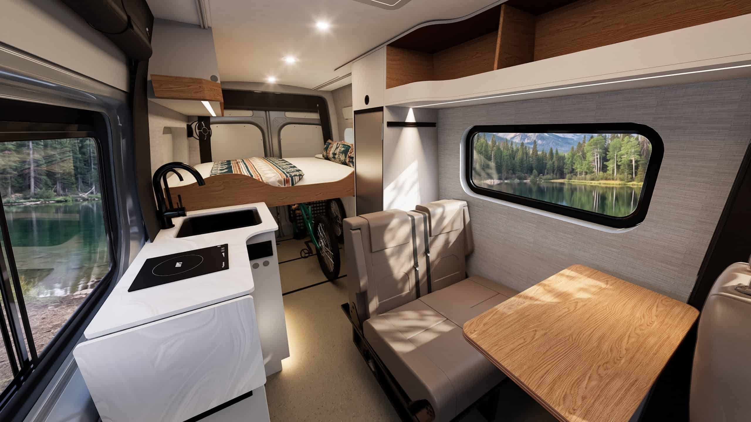 The interior of the Yama Vans Luna with an induction galley, dinette seating, wood table, and a large window