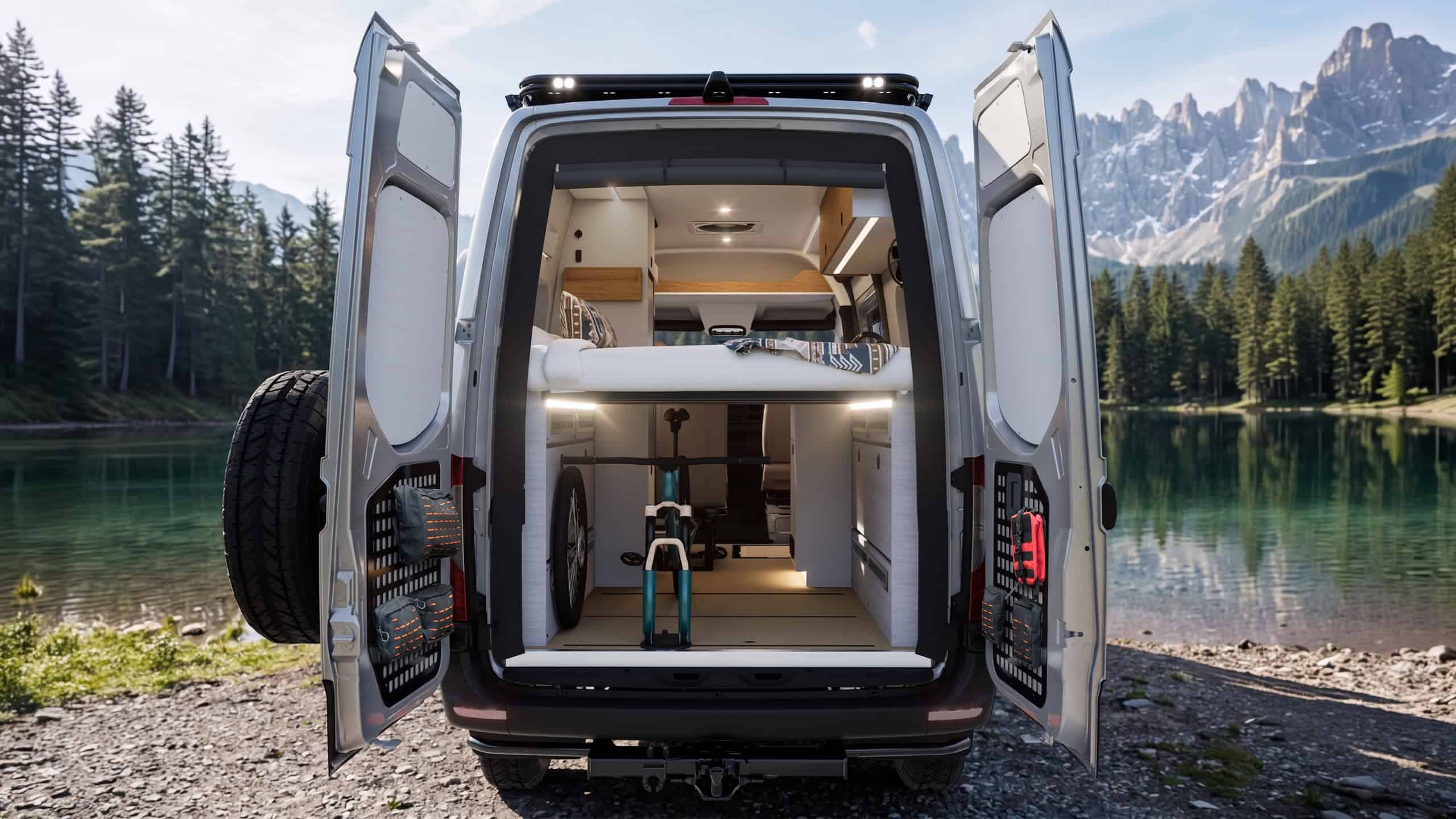 The Yama Vans Luna with rear doors open showing the gear garage with a mountain bike and the elevated platform bed above