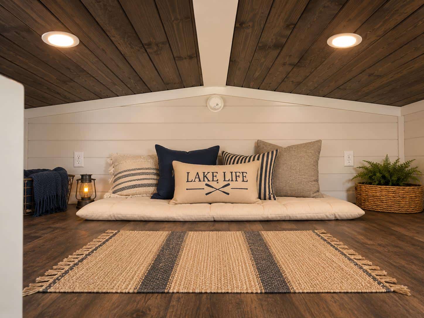 Avery 127 loft with white shiplap walls and a wood ceiling