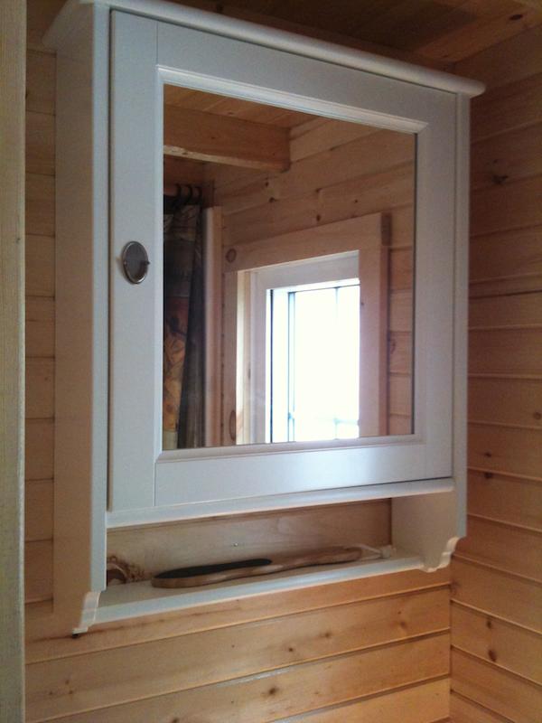 Bathroom Storage and Mirror Inside Tiny Home on Wheels