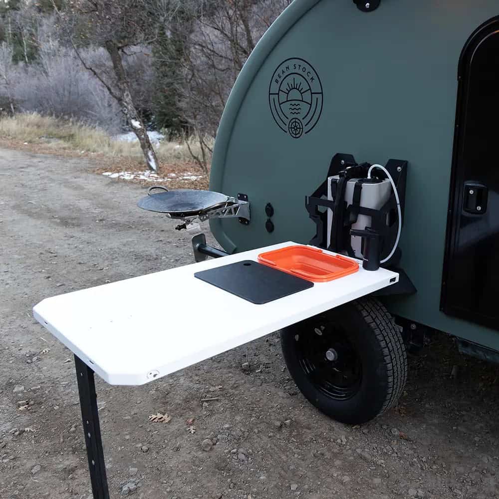 Sage Bean Stock 2.0 teardrop with outdoor side table, collapsible sink, and swivel griddle deployed