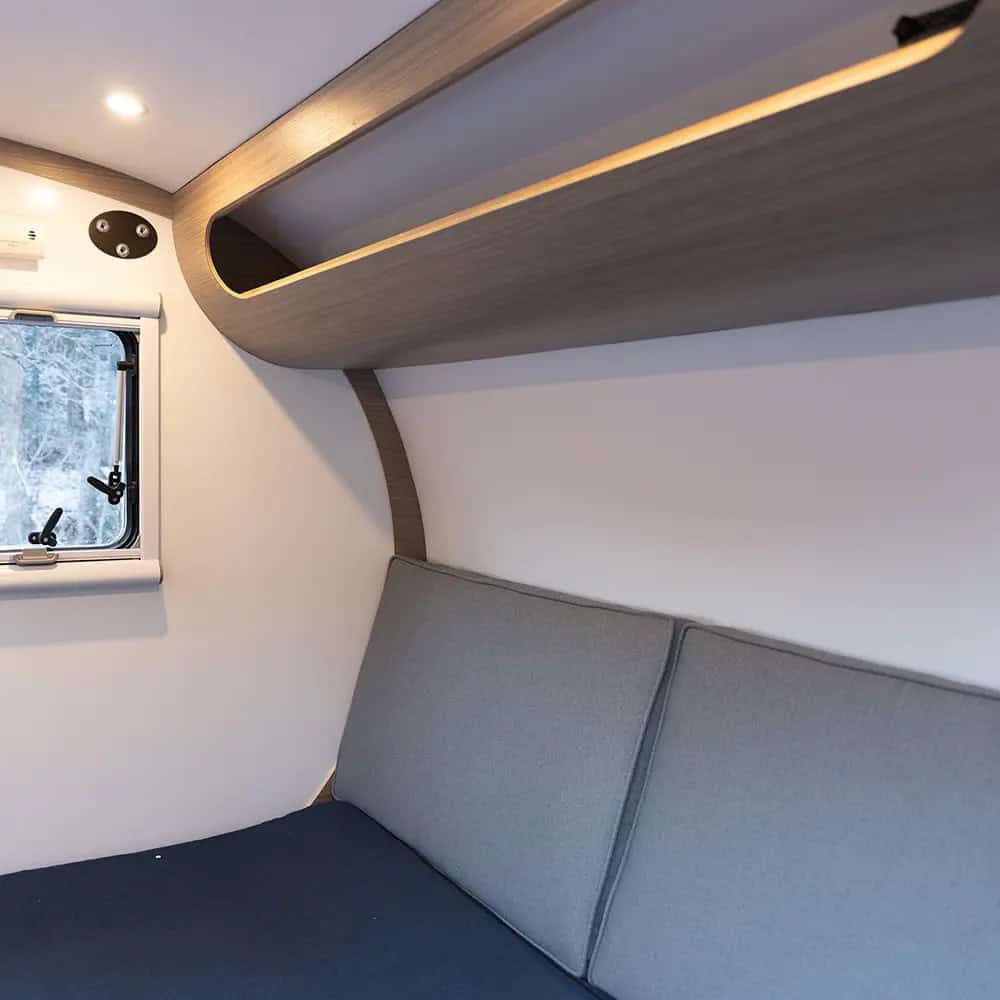 Overhead cubby storage above the Bean Stock mattress