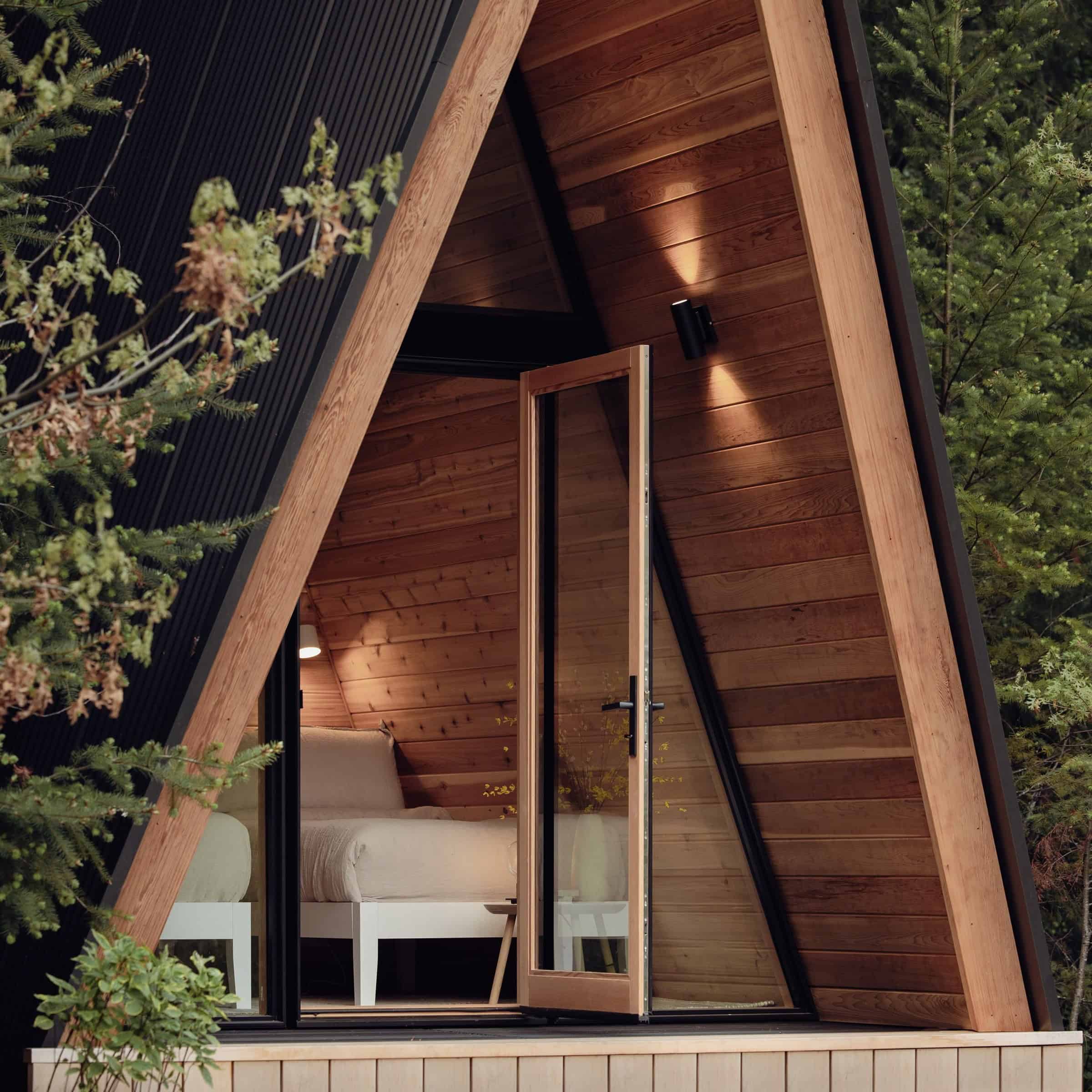 System 00 close front entry with open glass door, wood interior and bunk visible
