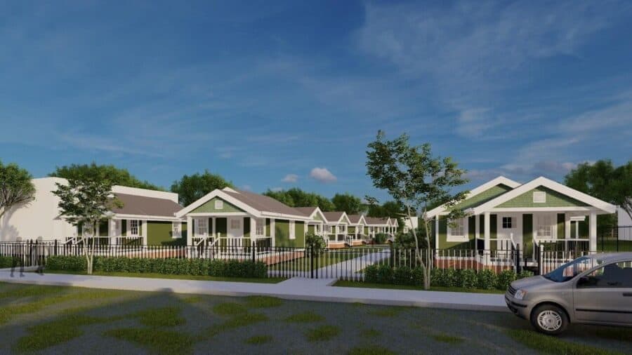 Architectural rendering of green cottage-style tiny homes along a walkway at BridgeWay Village Spartanburg