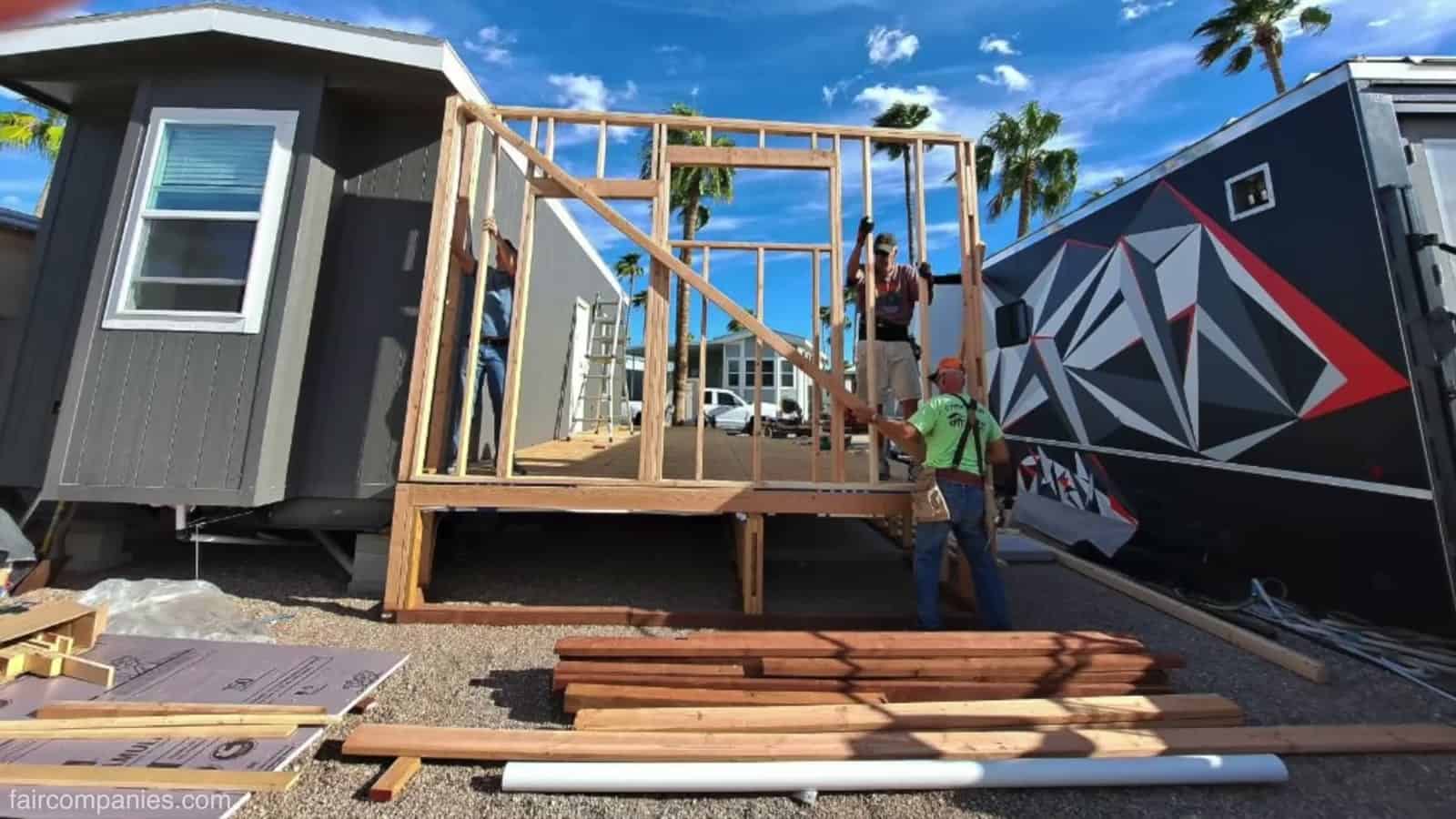 Framing the stick-built Arizona room addition beside the park model shell