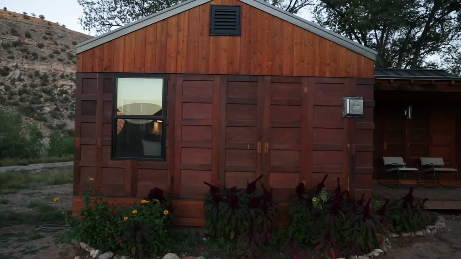 Camp V cabin sided entirely with reclaimed wooden interior doors