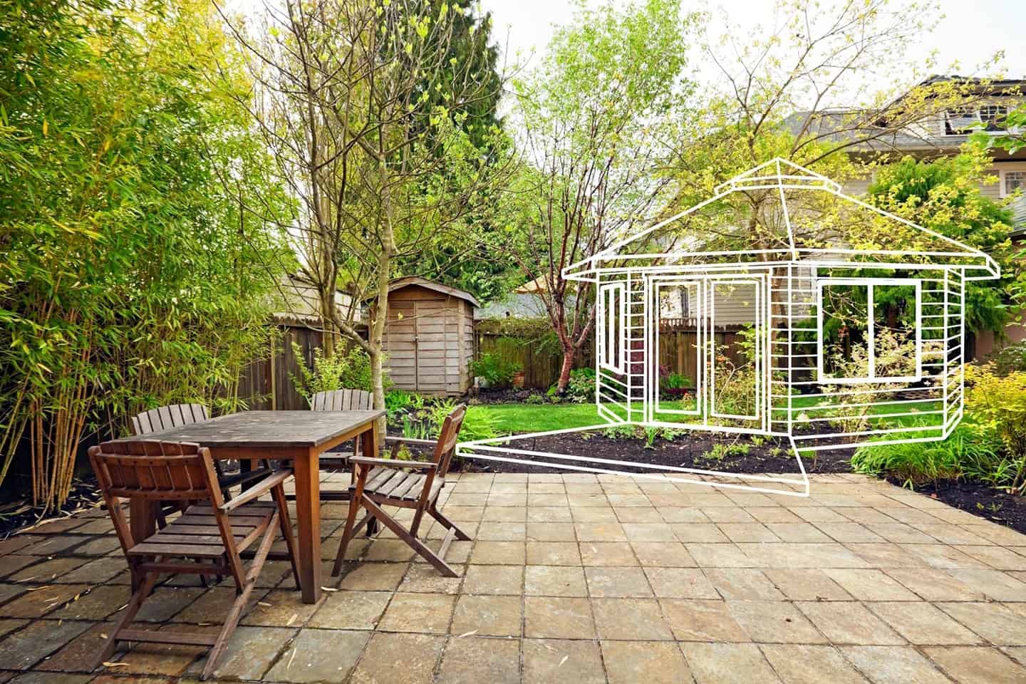 Deltec Backyard Cottage circular home exterior in a landscaped setting