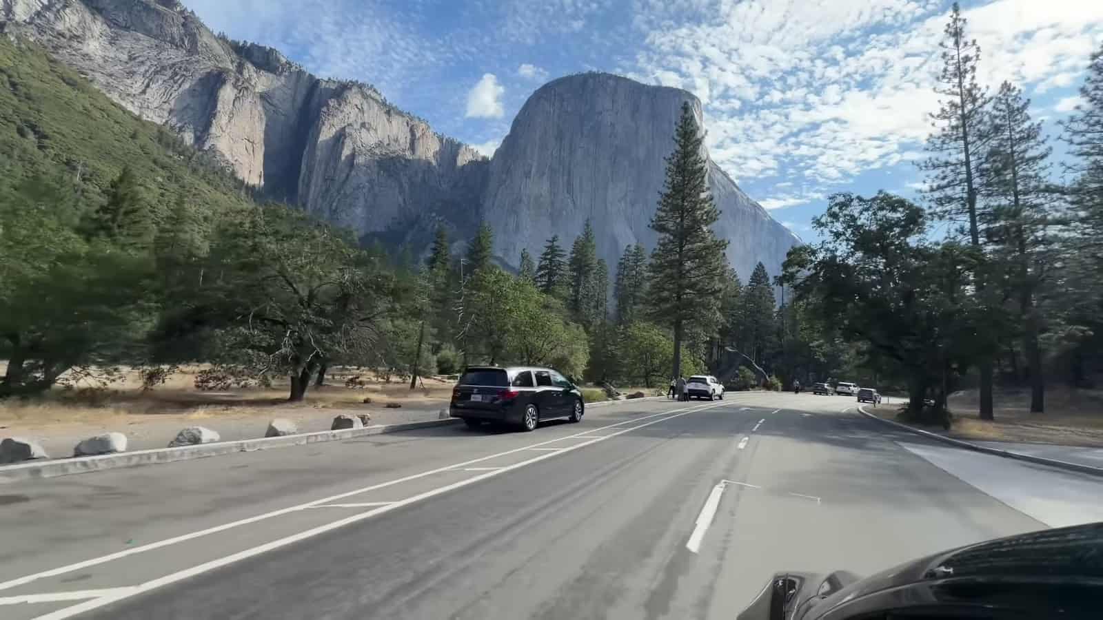 Driving a Tesla into Yosemite Valley with El Capitan ahead