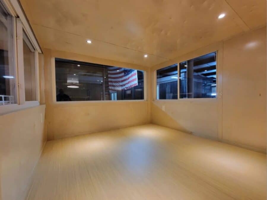 Bright interior of eONE XL tall tiny house on clearance.