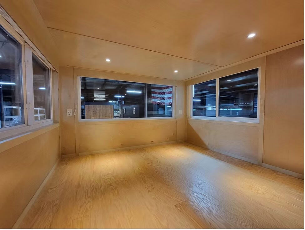 Bright second-floor retreat in the eONE XL flooded with natural light from large windows