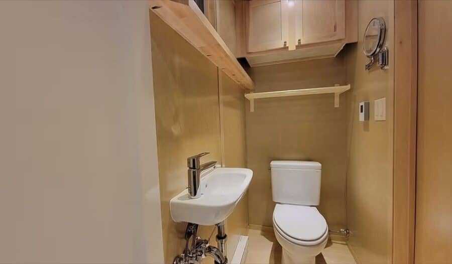 Full bathroom with walk-in shower and modern vanity