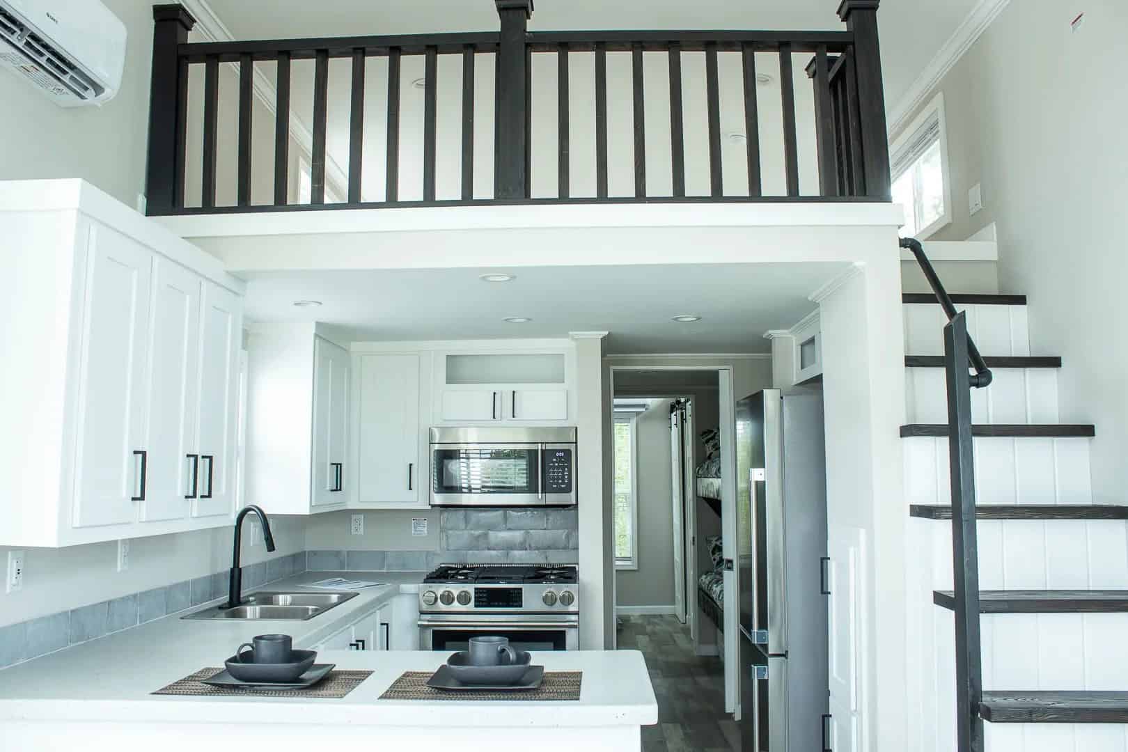Loft rail and stairs above the kitchen
