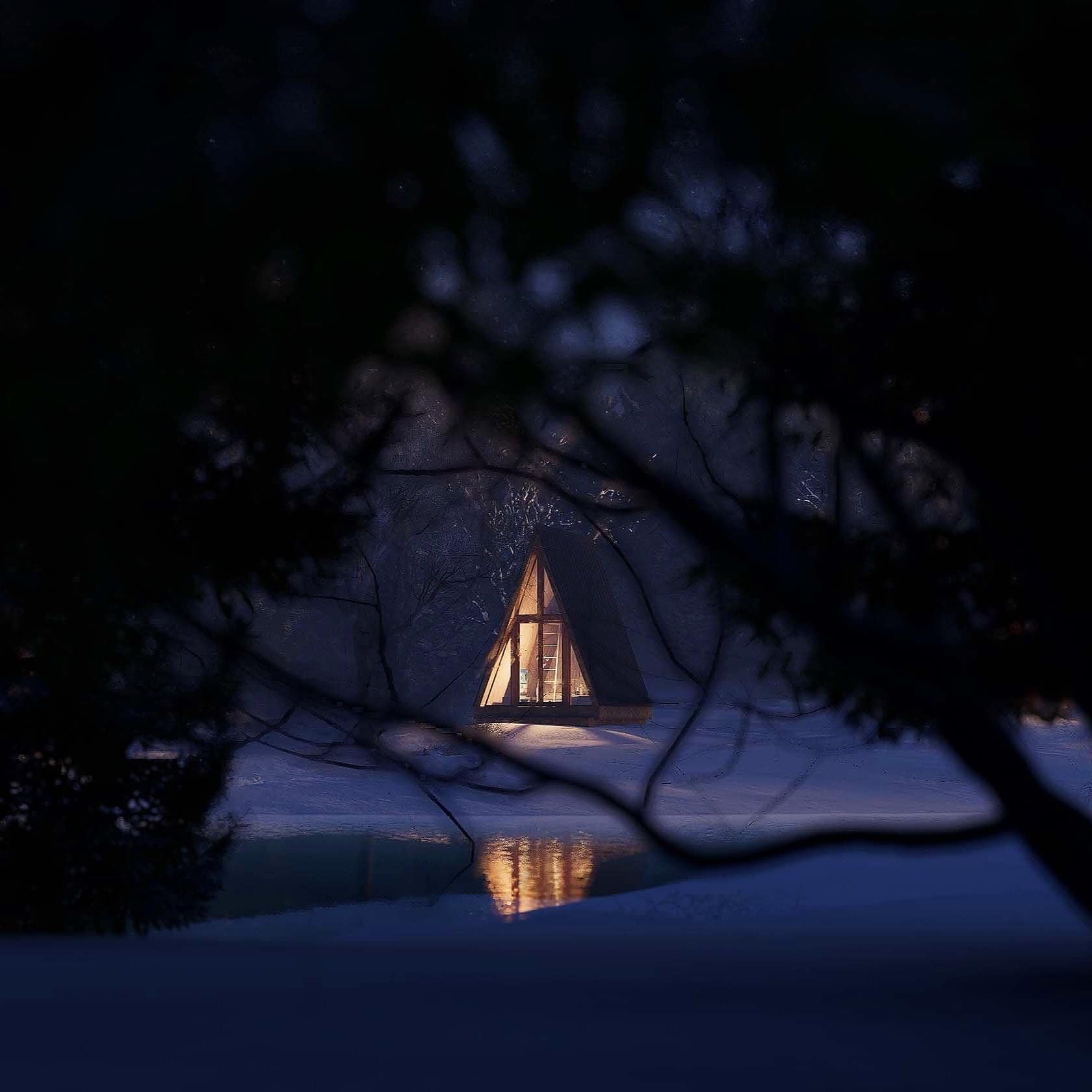 A charming tiny house illuminated at night, nestled among snow-covered trees in a peaceful winter la.