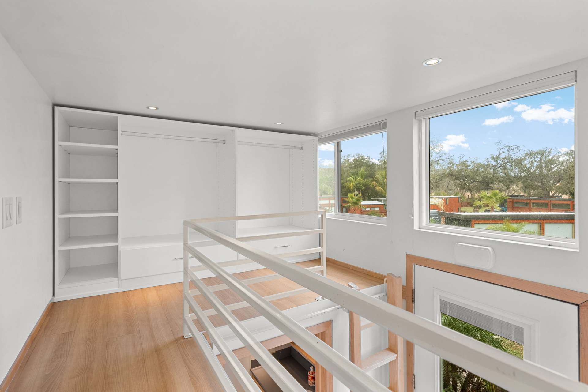 Second loft with custom California Closet storage in the Escape One XL