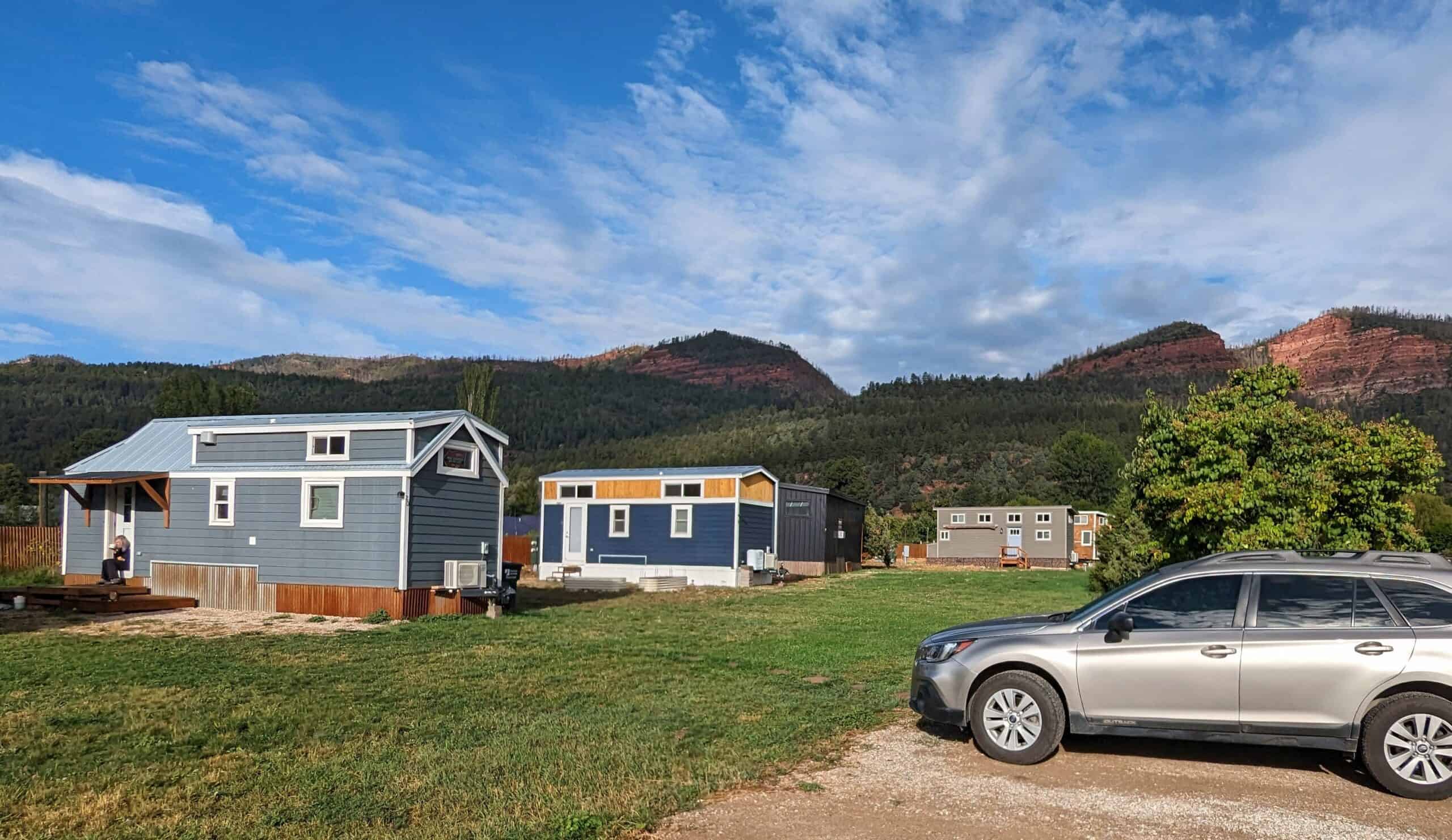 Tiny homes with Animas Valley mountains at Hermosa Orchards Village
