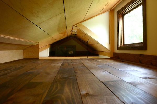 Inside the sleeping loft in the Tall Man's Tiny House