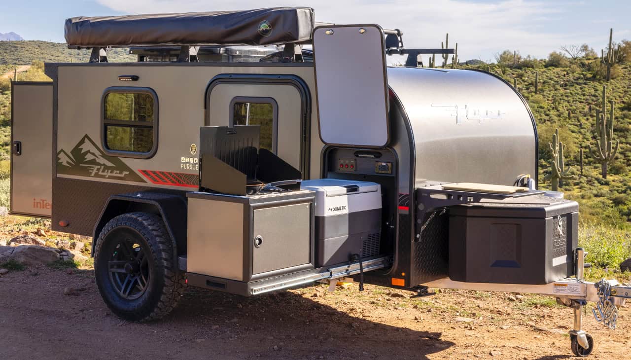 inTech 2027 Flyer Pursue curbside with slide-out kitchen open