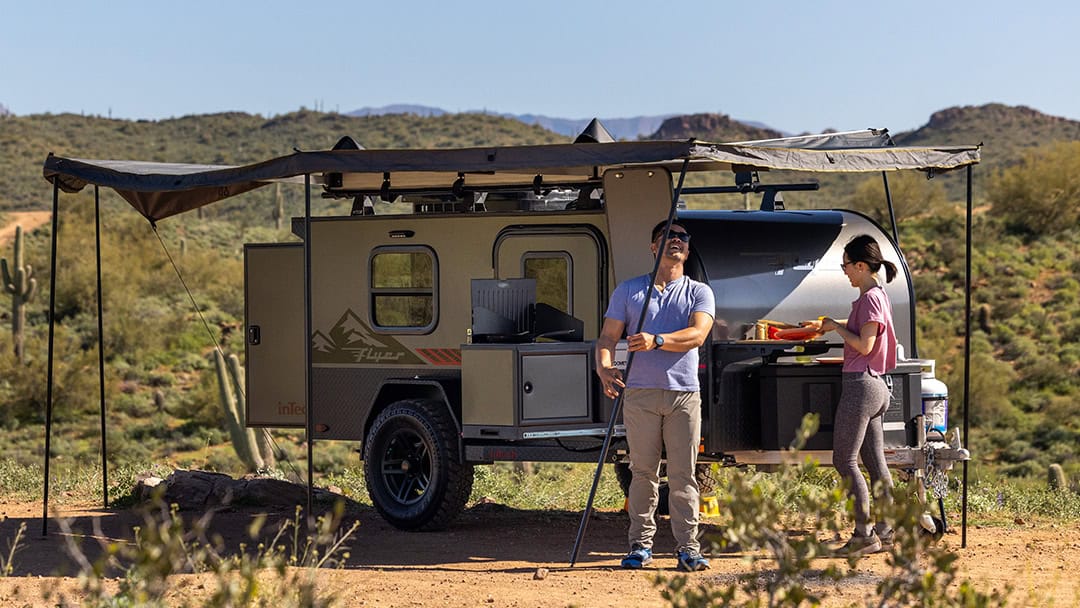 inTech Flyer Pursue curbside with awning and slide-out kitchen