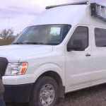man-living-off-grid-in-nissannv-2500-van-001