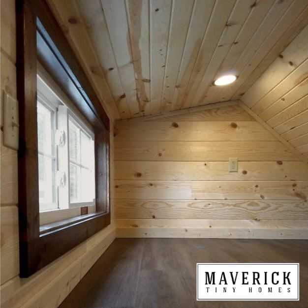 Maverick Quantum gallery loft interior: pine tongue-and-groove, loft bedding