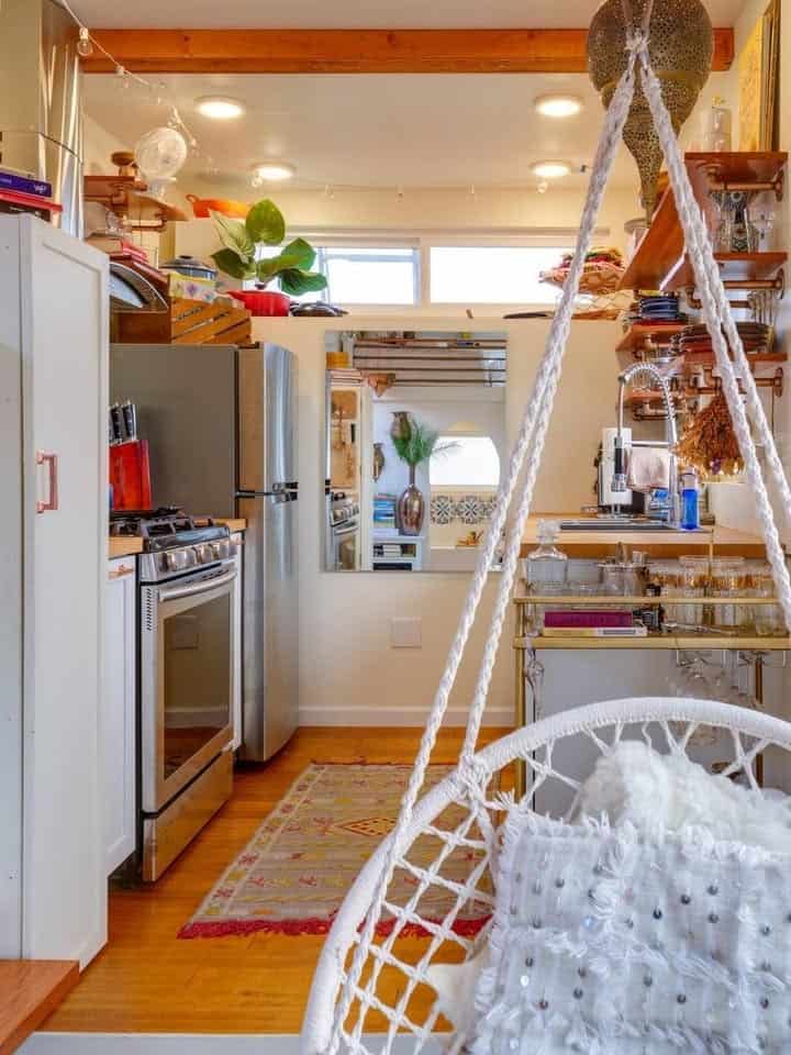 Full size kitchen with gas range and butcher block counters in the Moroccan tiny house
