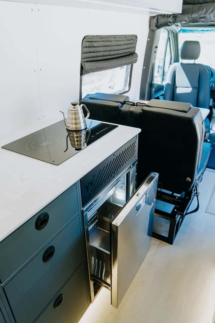 The collapsible CUBE Wetroom shower and cassette toilet inside the Nanuq camper van