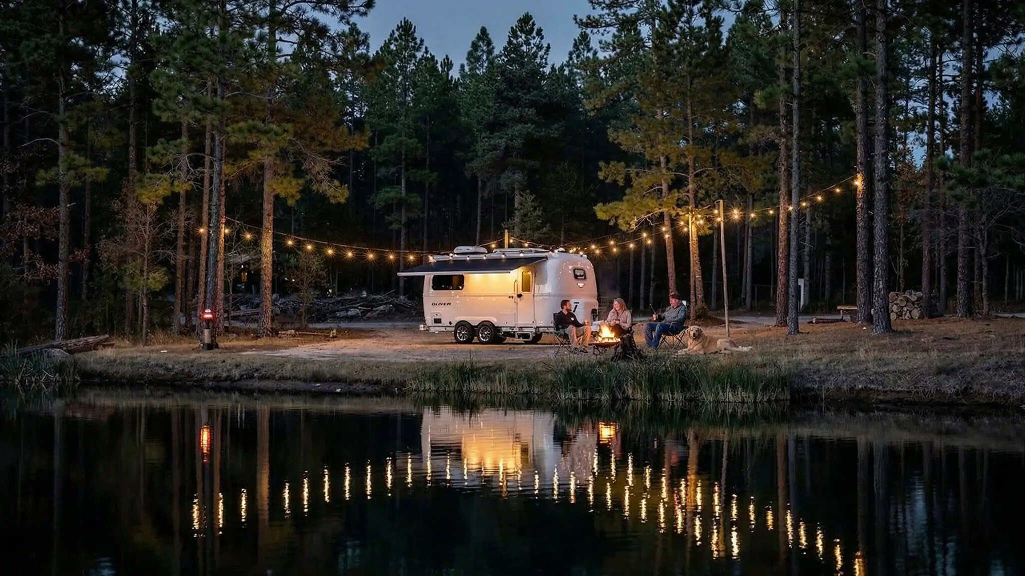 Oliver Legacy Elite II at a lakeside campsite at dusk