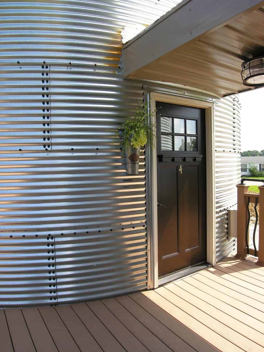 Exterior entrance to a round two-story silo suite attached to Patoka Lake Winery