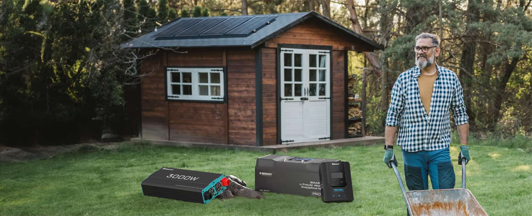 Off-grid tiny house cabin with Renogy rooftop solar panels, a 3000W inverter, and a lithium battery