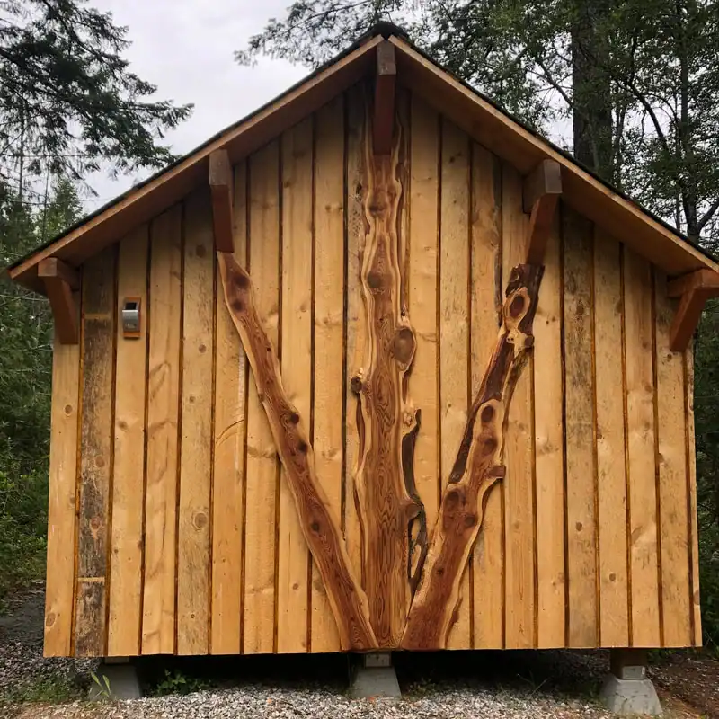 Gable-end close-up of the King Wood Cabin salvaged wood exterior