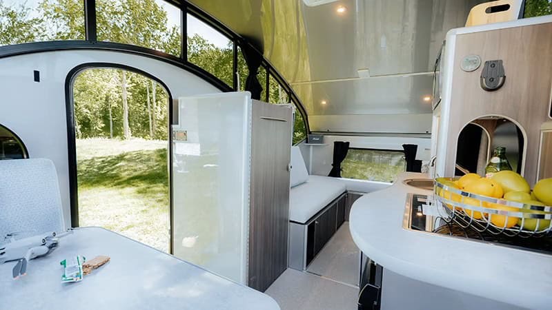 Full interior of Alto R1713 with galley, enclosure, and retractable roof raised, Safari Condo