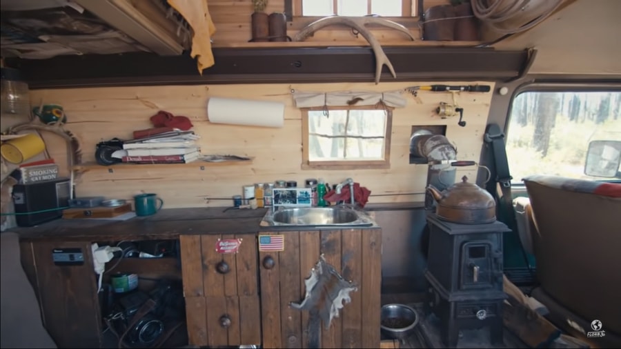 He’s been living in his rustic cabin van conversion for four years