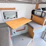 Big Ripper interior — lounge seating and butcher block table