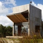 Small Beachfront Home is Elegant, Modern, and on Sleds