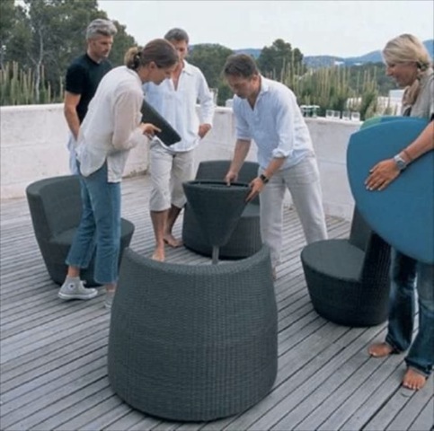 Stackable Patio Set for Small Outdoor Spaces Four Lounge Chairs and a Table that Stack into One