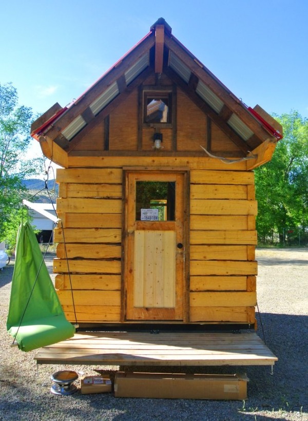 stanley-rocky-mountain-tiny-houses-log-cabin-on-wheels-flipping-overhangs-greg-parham-0001