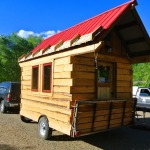 stanley-rocky-mountain-tiny-houses-log-cabin-on-wheels-flipping-overhangs-greg-parham-00015