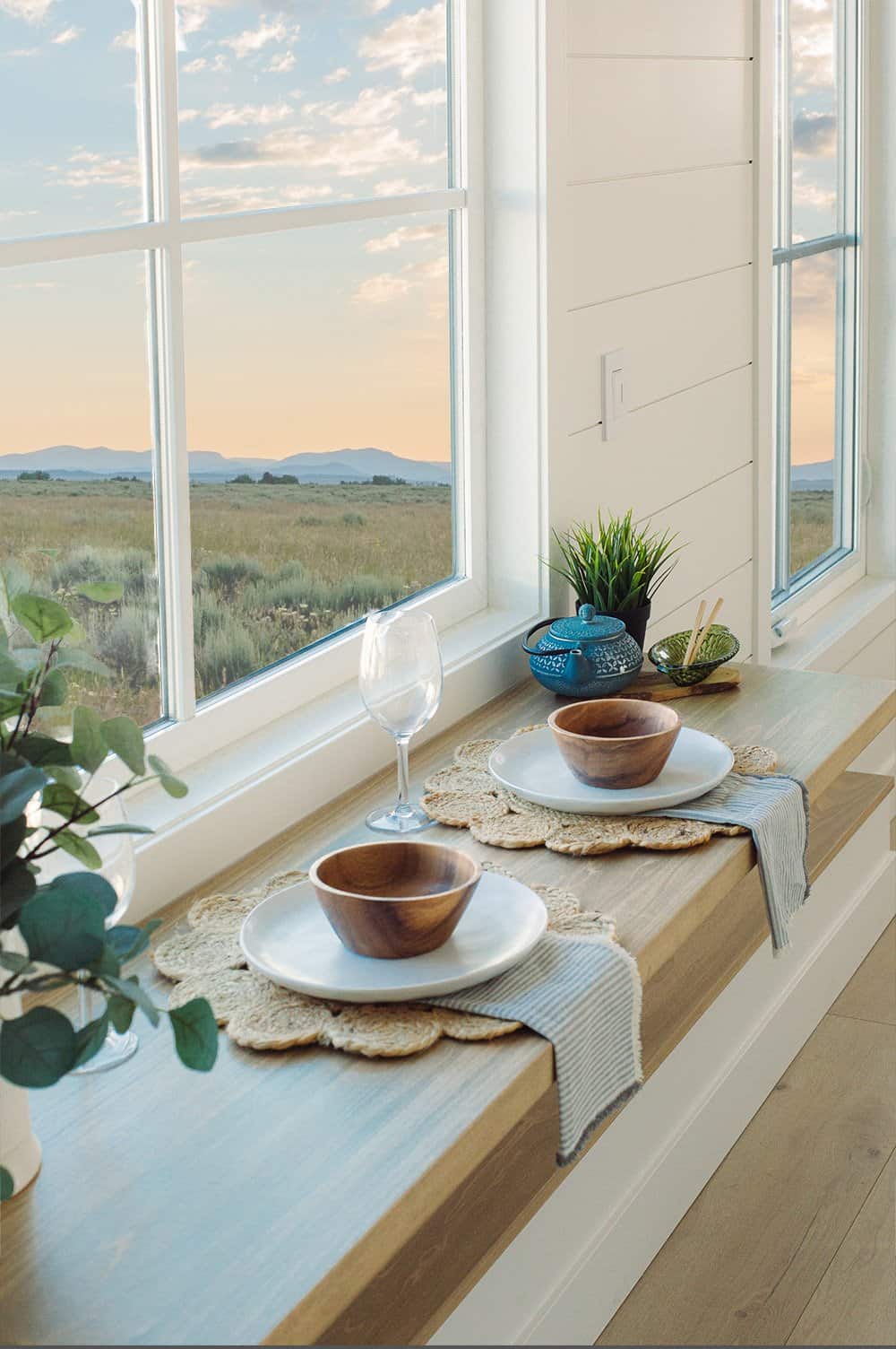 Summit Boho window breakfast bar: floating wood bar, window light, warm contemporary finish