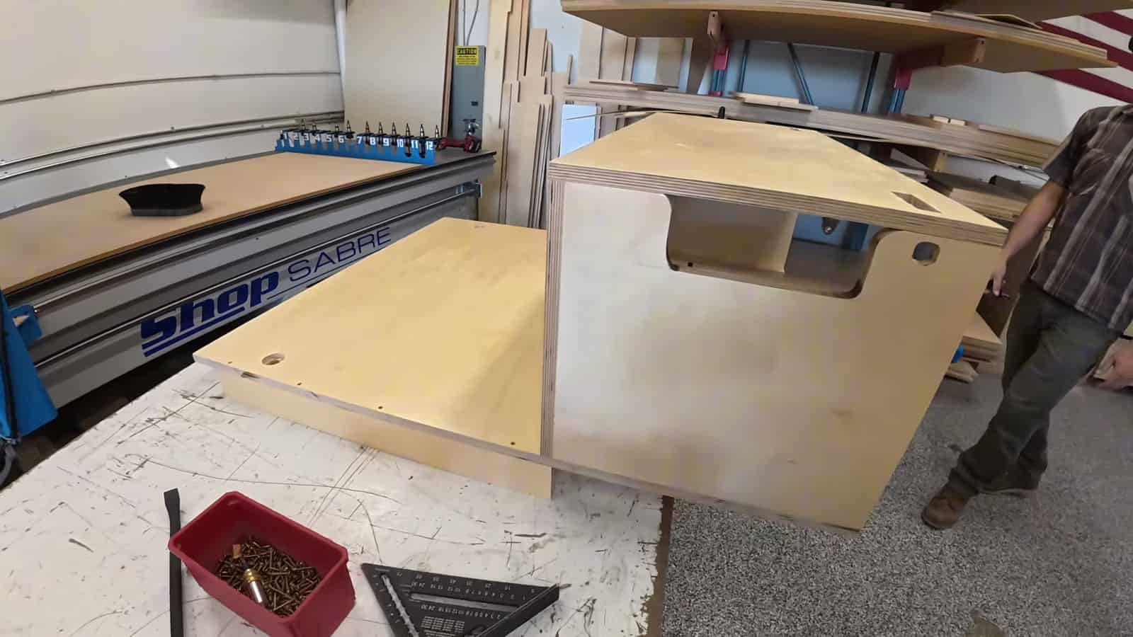 Birch plywood drawer cabinet for a Tesla Model X being built on a CNC table
