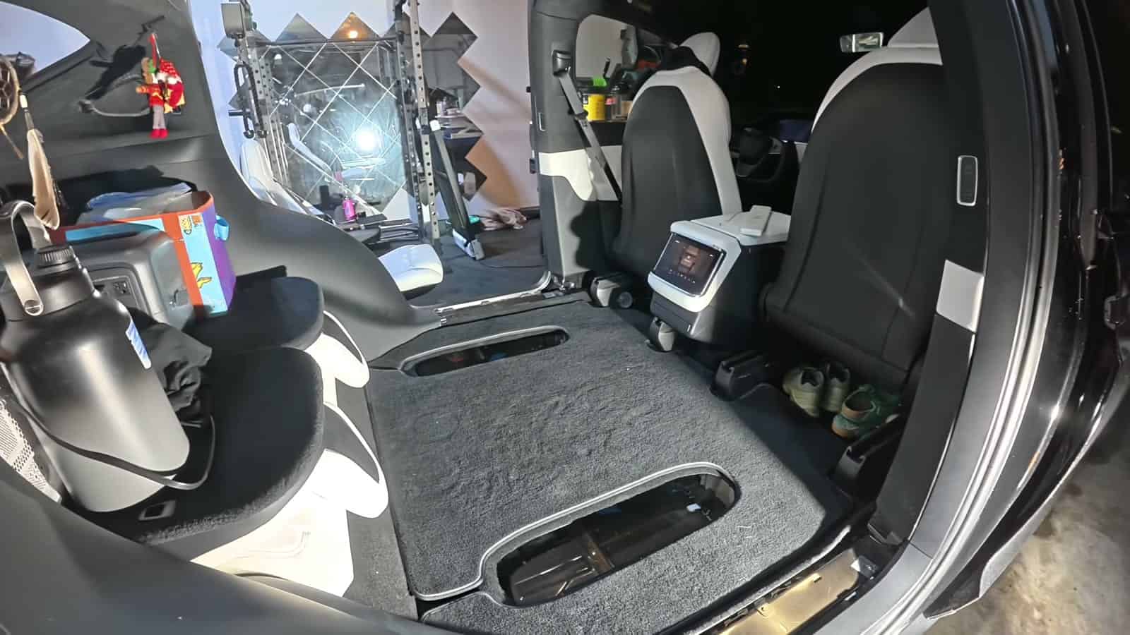 Tesla Model X interior with rear seats removed and carpeted floor