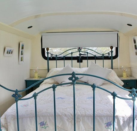 Upstairs bed at the front of the bus