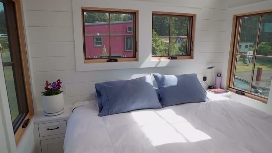 Ground-floor bedroom with windows on three sides