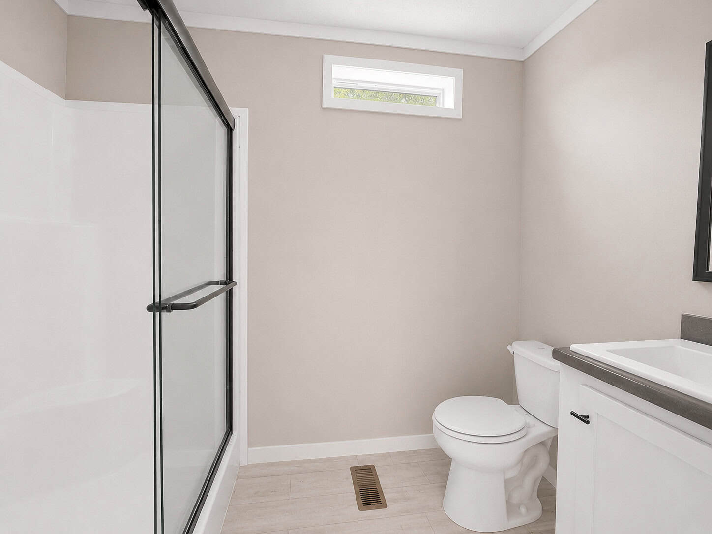 Tiny Life Urban bath with black-framed glass shower, toilet, and vanity